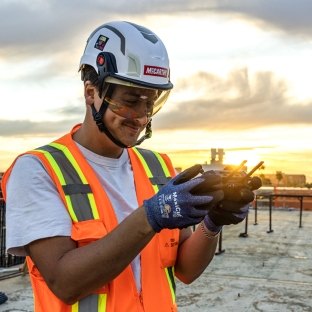 employee flying drone