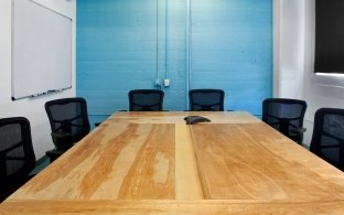 Table and chairs in a conference room.