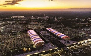 Aerial View of Hartsfield-Jackson Atlanta International Airport North and South Terminal Canopies Lit Up