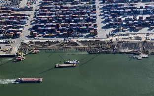 Aerial view of the container terminal with waterway in the foreground