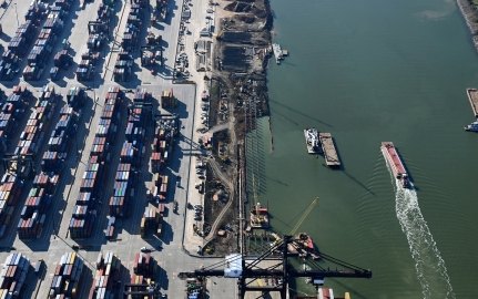 Aerial view of the container terminal with a waterway on the righthand side