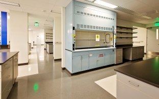 Another view of the lab area with a long table