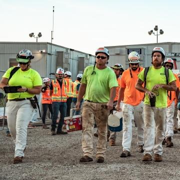 Craft employees walking to jobsite