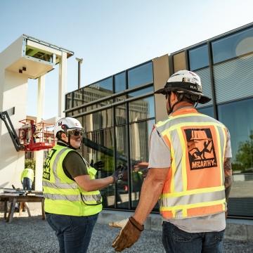 Employees talking about a mock-up