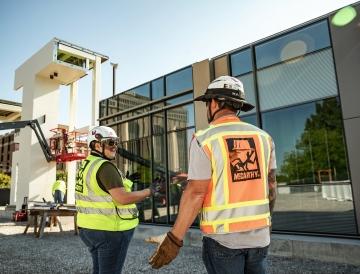 Employees talking about a mock-up