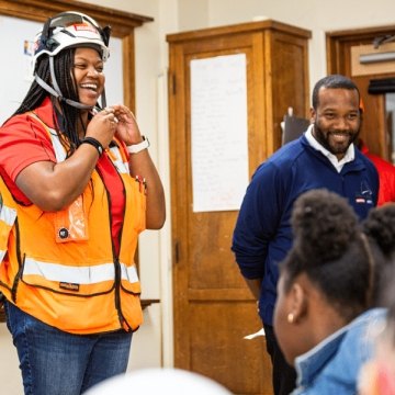 A superintendent speaking to students