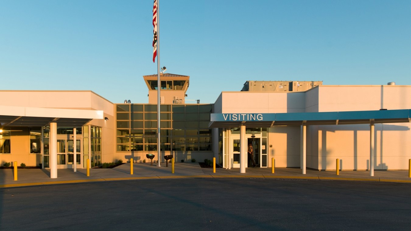 Housing and Healthcare Facility Stockton Entrance with U.S. Flag