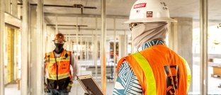 2 construction workers on a jobsite