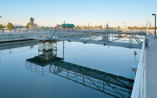 Bridgework over a large pool at the water plant.