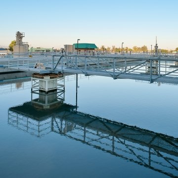 Bridgework over a large pool at the water plant.