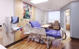 Patient room, bed, lounge chair, computer