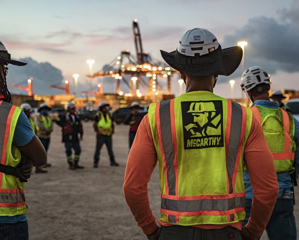 employees having safety meeting