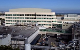 Exterior and aerial view of a 5-story building.