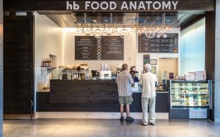 People standing in line at a cafe