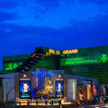 Exterior view of Hakkasan with the lion statue in front and MGM Grand in the background. 