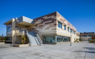 Exterior view of the middle school including an outdoor staircase.