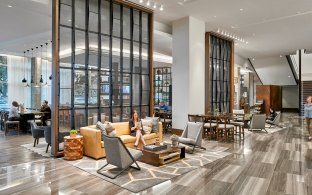 Indoor lobby area with seating pods