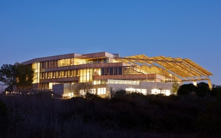 Brilliant exterior shot of the J. Craig Venter Genome facility at dusk.