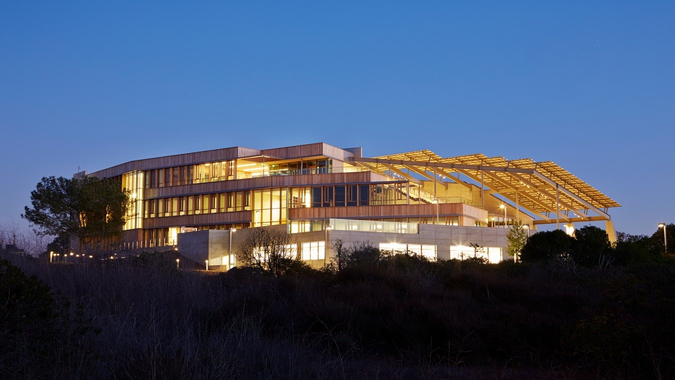 Brilliant exterior shot of the J. Craig Venter Genome facility at dusk.