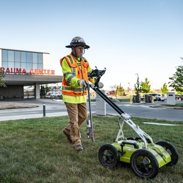 A man doing subsurface utility mapping