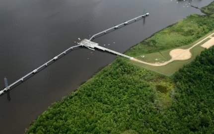 Aerial view of the facility over the water