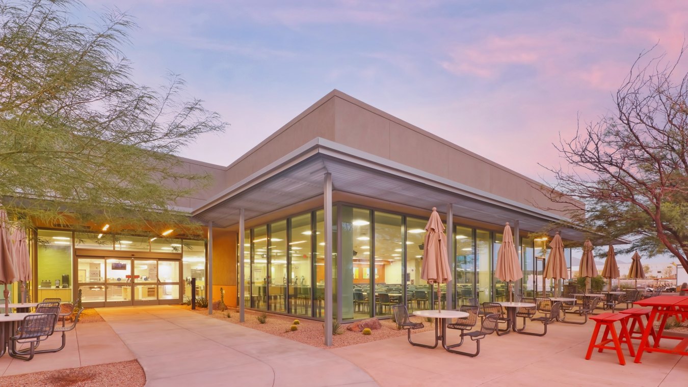 Mayo Clinic building exterior and outdoor seating with umbrellas