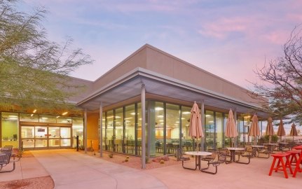 Mayo Clinic building exterior and outdoor seating with umbrellas