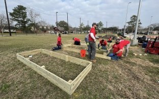 employees building something for charity