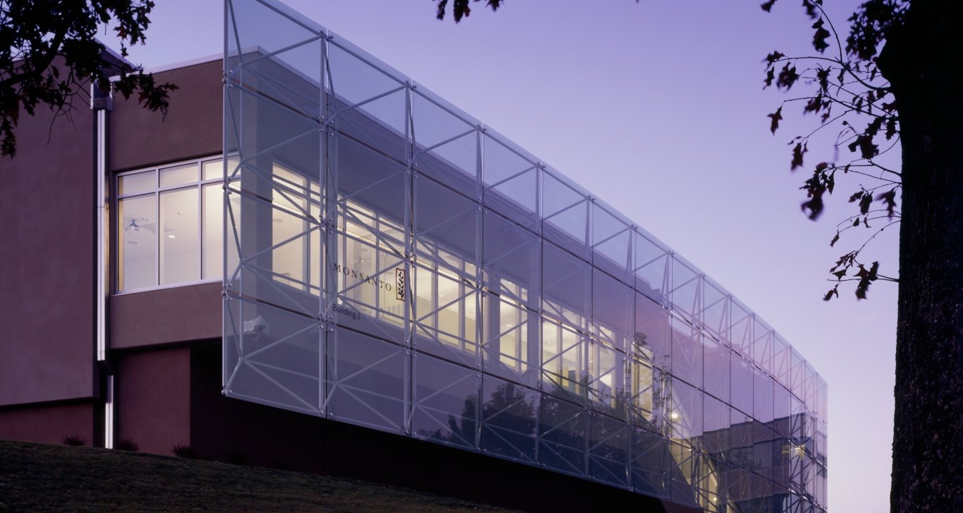 Outdoor image of the front of the building which is all glass