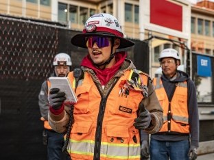 employee leading a safety meeting