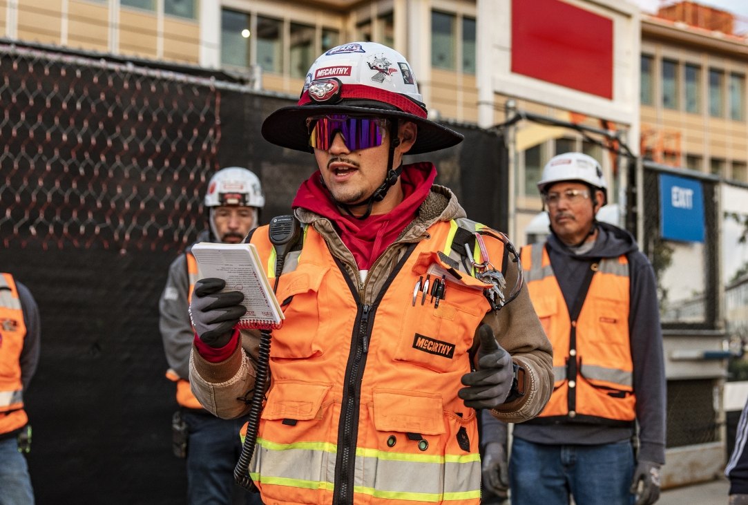 employee leading a safety meeting