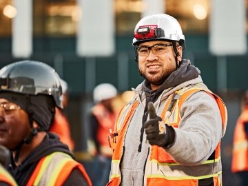 Construction worker giving a thumbs up.