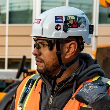 employee on jobsite looking away from camera