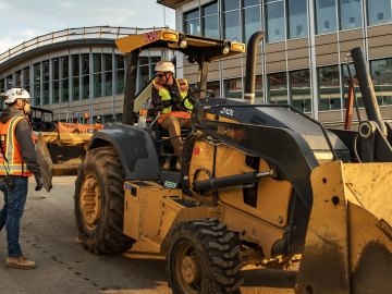 Employees talking to each other a jobsite