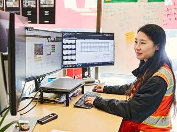 A person sitting at a desk working.