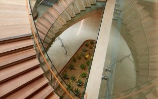 UCSD Center for Novel Therapeutics circular interior stairway looking down from the top