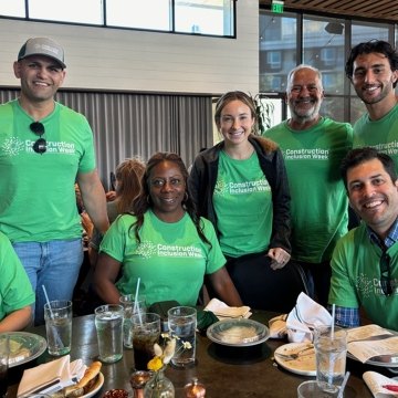 Group of people celebrating construction inclusion week at lunch