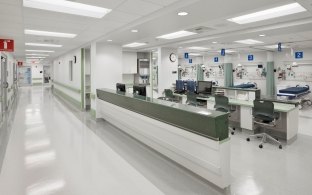 Indoor image of a hallway and the nurses station