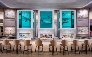 Bar with a long bar top and high-top chairs