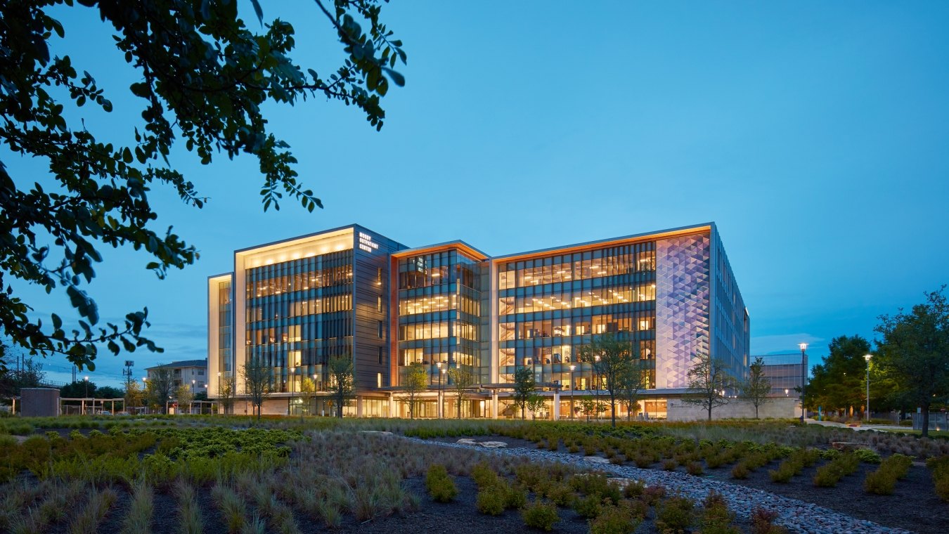 Exterior view of the clinic building at nighttime