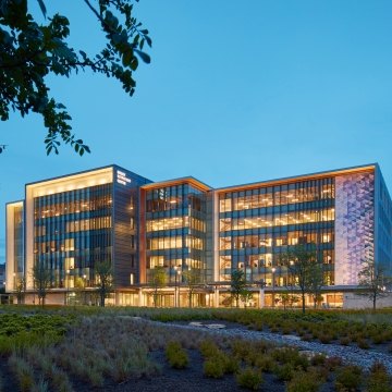 Exterior view of the clinic building at nighttime