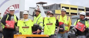 Construction workers celebrating the topping out of Piedmont Cartersville Medical Center.