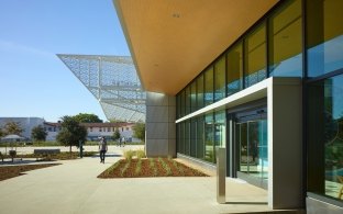 Side of the building profile with pavement and plants