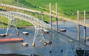 Aerial view of the completed bridge over the water