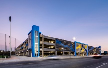 Exterior view of the parking garage at night.