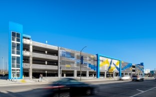 Exterior view of the parking garage during the daytime.