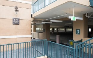 A view of the Soka University parking structure near an entrance.