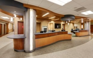 Indoor image of a long desk and hallway