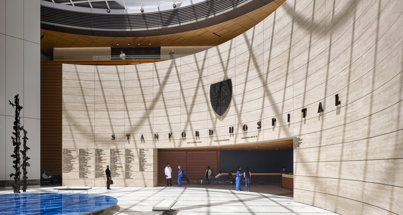 View of the entryway to the hospital with a curved wall and rectangular opening