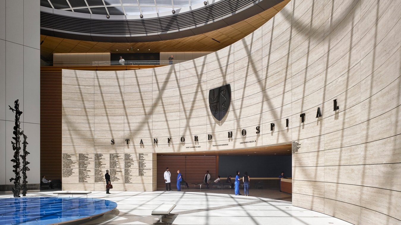 View of the entryway to the hospital with a curved wall and rectangular opening